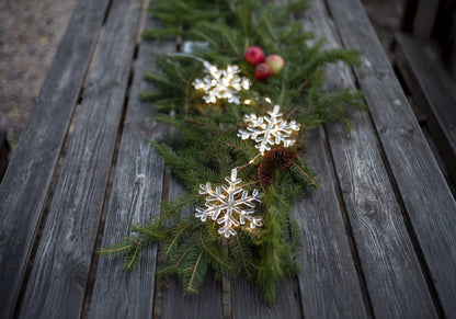 Belysning Jul Snöflingor hängande på rad