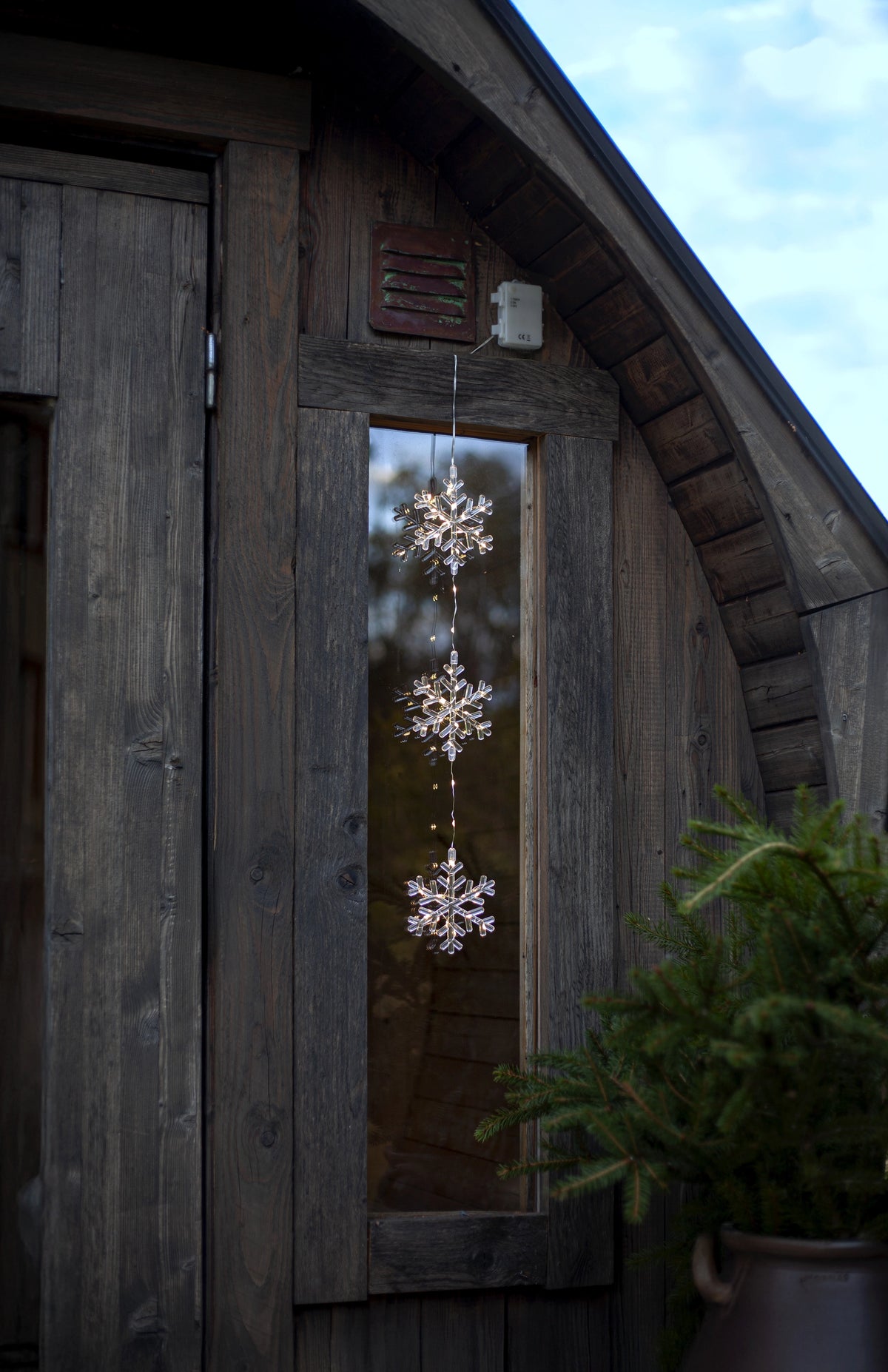 Belysning Jul Snöflingor hängande på rad
