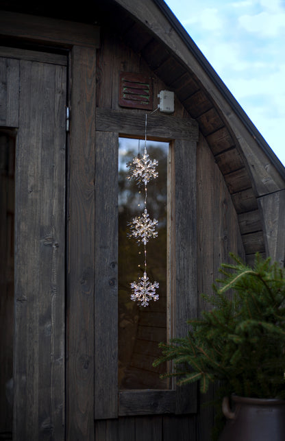 Belysning Jul Snöflingor hängande på rad